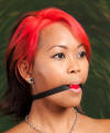 Extra-Small Red Ball gag on Jess Hawk