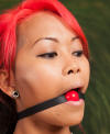 Extra-Small Red Ball gag on Jess Hawk
